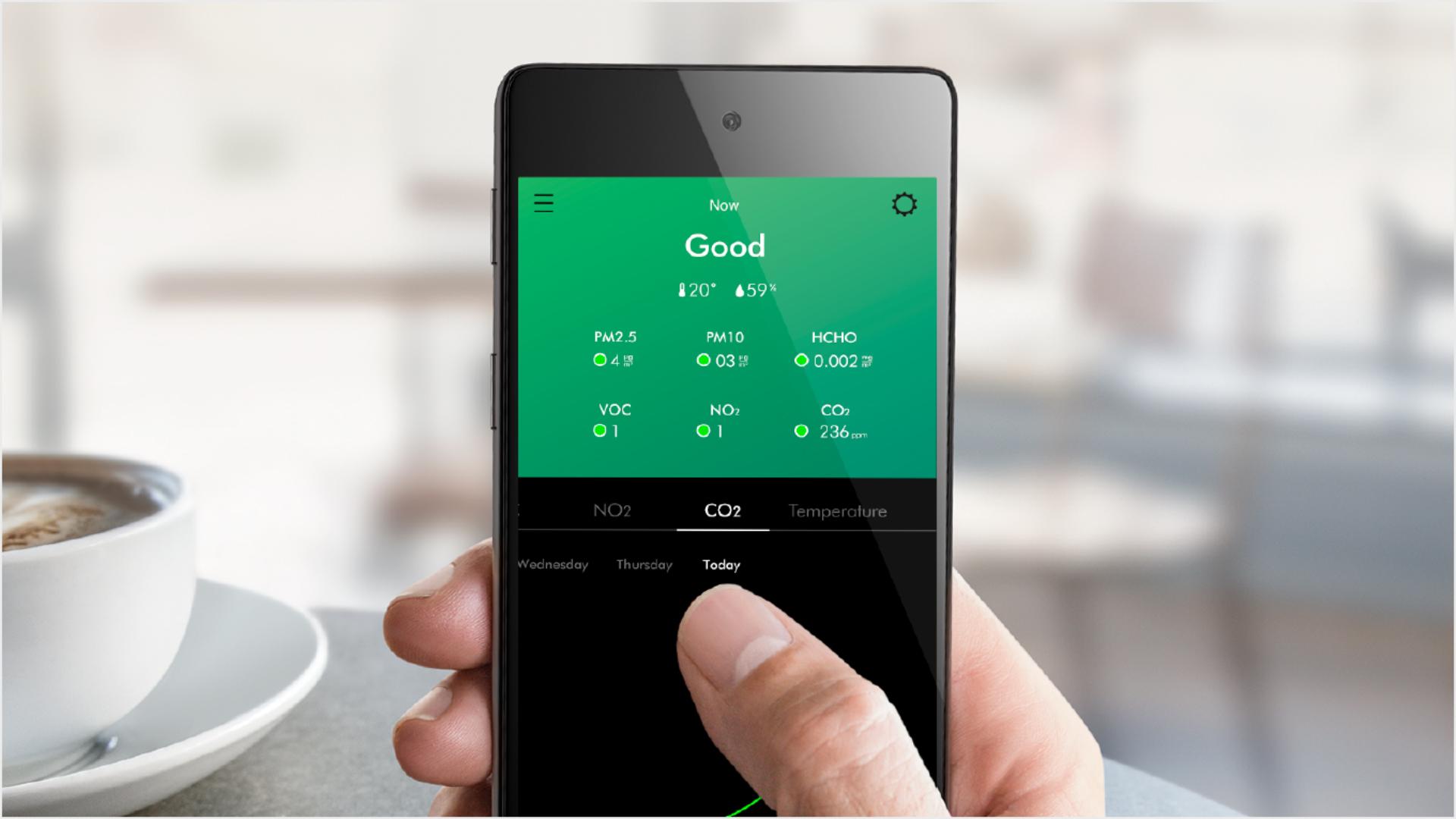 The MyDyson app being used at a café.